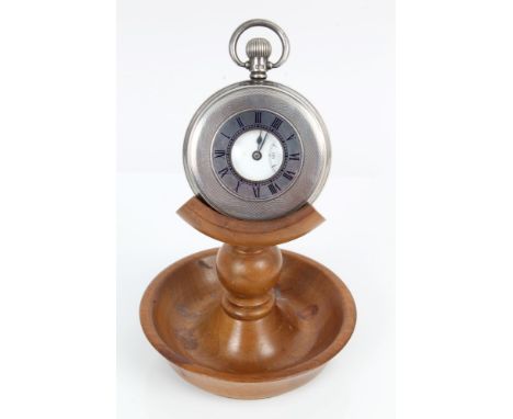 Silver cased half hunter fifteen jewel pocket watch with white enamel face, Roman numeral markers and subsidiary seconds dial