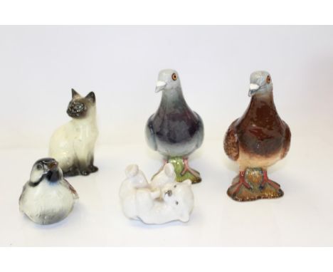 Two Beswick pigeons, model no. 1383, Royal Copenhagen bear, Beswick cat and a Goebel bird (4)