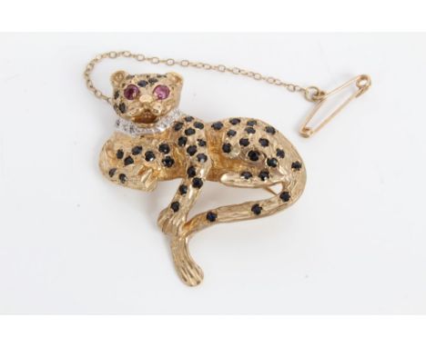 Gold (9ct) novelty leopard brooch with black sapphire spot decoration and ruby set eyes, 45mm CONDITION REPORT Weight 10.4 gr