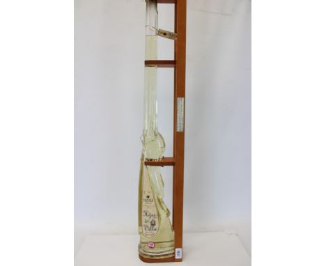 Novelty bottle of Tequila in the form of a shotgun on stand
