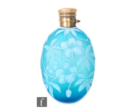 A large late 19th Century Thomas Webb &amp; Sons lay scent of compressed ovoid form, cased in opal over pale blue and cut wit