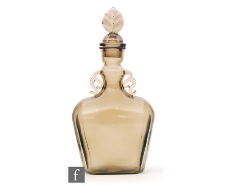 An early 20th Century Orrefors Sandvik decanter designed by Simon Gate, cinnamon tinted, the compressed flared shouldered for