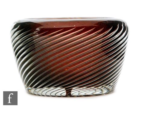 A small Kaj Frank for Nuutäjarvi ariel glass bowl of oval section, cased in clear crystal over ruby, internally decorated wit