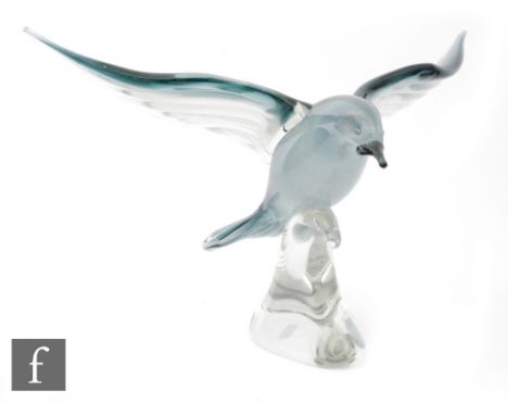 A post war Italian Murano glass figure of a stylised seagull in the manner of Seguso with a graduated grey tint body, mounted