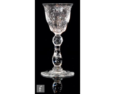 A late 19th Century Thomas Webb &amp; Sons 'Rock Crystal' type drinking glass with ogee bowl decorated by J. Palme with parro