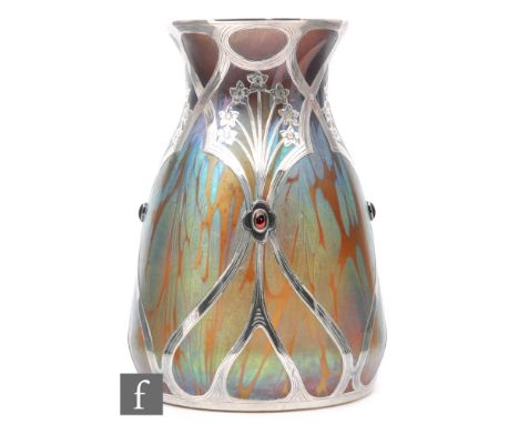An early 20th Century Loetz silver overlay vase circa 1901, the swollen ovoid body rising to a waisted collar neck and everte