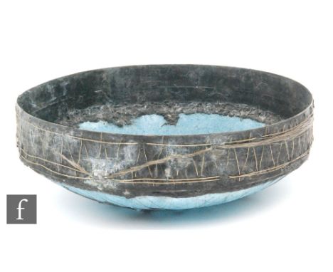 A later 20th Century Pate de Verre bowl designed by Heike Robertson in a light grey with deep metal rim and applied decorativ