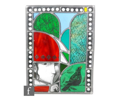 A contemporary studio stained glass panel by Frans Wesselman decorated with panels depicting a black bird singing to a bough 