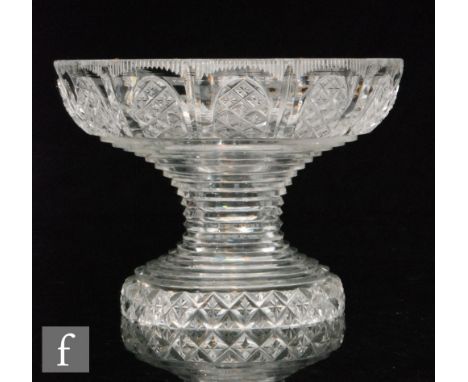 A late 18th Century cut crystal pineapple or bowl stand circa 1800 of waisted circular form, heavily cut with a repeat strawb