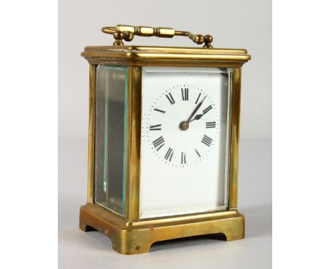 A 19TH CENTURY FRENCH BRASS TIMEPIECE CARRIAGE CLOCK. 4ins high.