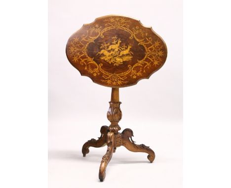 A "BLACK FOREST" WALNUT AND MARQUETRY TRIPOD TABLE, the shaped top inlaid with a scene of mountain goats, on a carved tripod 