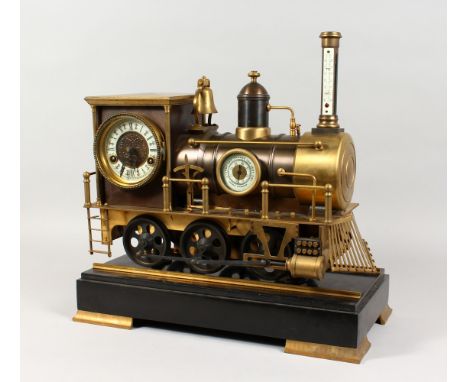 AN UNUSUAL CLOCK, BAROMETER AND THERMOMETER, modelled as a steam train, with moving wheels, striking on the bell, on a platfo