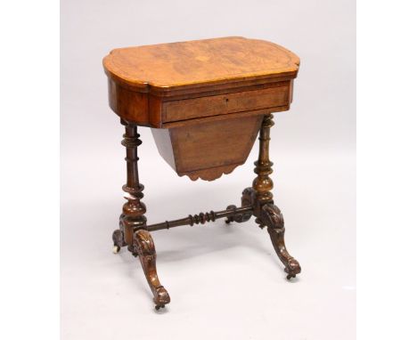 A VICTORIAN WALNUT COMBINATION GAMES/WORK TABLE, with folding top revealing chess, backgammon and cribbage board, over a draw