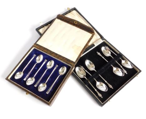 CASED SETS. A set of six silver apostle spoons, Sheffield 1900 (matched case) & a set of six demitasse spoons by Hukin & Heat