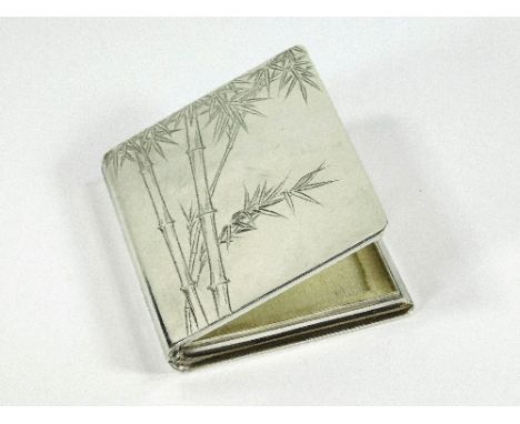 SILVER COMPACT. A Japanese 950 Standard Sterling silver powder by Asahi. Engraved to both sides with bamboo & signed.Please n