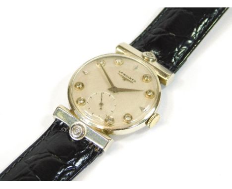 LONGINES. A Longines 14k cased wristwatch with diamond set lugs & diamond set dial. Dial diameter, including crown winder 3cm