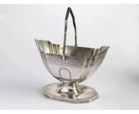 SUGAR BASKET.  A Victorian swing-handle sugar basket. London, 1885. Approx. 188.3g (6 t.oz)Please note that all items in this