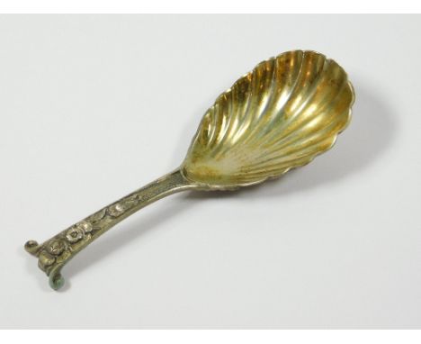 CADDY SPOON. A Victorian silver caddy spoon with floral cast scroll handle.Please note that all items in this auction are pre