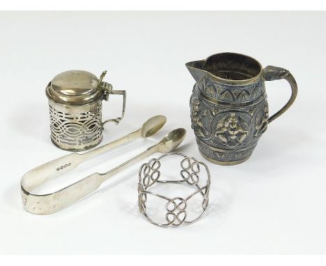 INDIAN SILVER ETC. A small Indian silver coloured metal cream jug with elephant handle. Also, a pair of silver Fiddle pattern