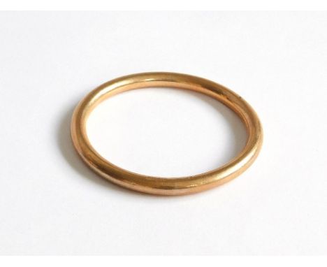 GOLD BANGLE. A 9ct. rose gold, hollow bangle. Approx. 12.6g. Please note that all items in this auction are previously owned 
