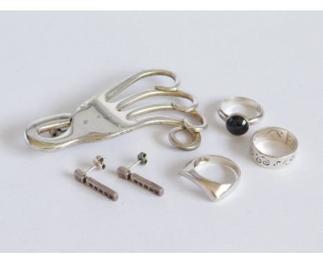 SILVER RINGS ETC. Three modern silver dress rings, a pair of silver drop earrings & an EPNS 'fork' brooch. Please note that a