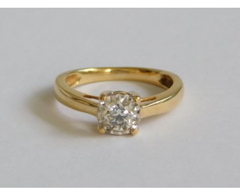 DIAMOND SOLITAIRE. A modern, 18ct. gold solitaire diamond ring, the round brilliant cut stone of approximately 0.50 carat spr