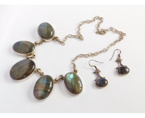 LABRADORITE. A silver mounted labradorite necklace of large oval stones & a pair of silver & labradorite earrings. Please not