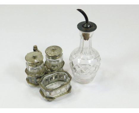 ELKINGTON CRUET ETC. An early 20th century Elkington & Co. three-section silver cruet stand, fitted with two silver mounted c