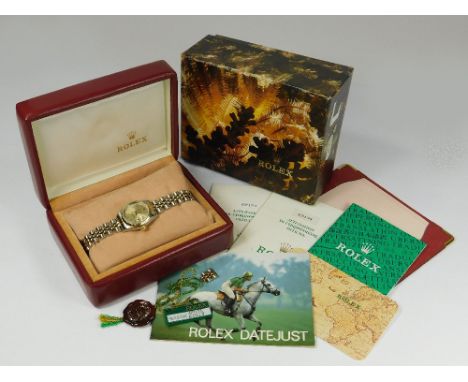 ROLEX. A lady's Rolex bi-coloured, stainless steel Rolex Oyster Perpetual Datejust wristwatch, the dial with baton numerals, 