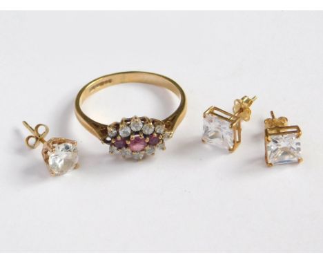 GOLD RING ETC. A 9ct. gold ruby set dress ring, a pair of 9k earrings set square clear stones & a single 9ct. gold earring. G