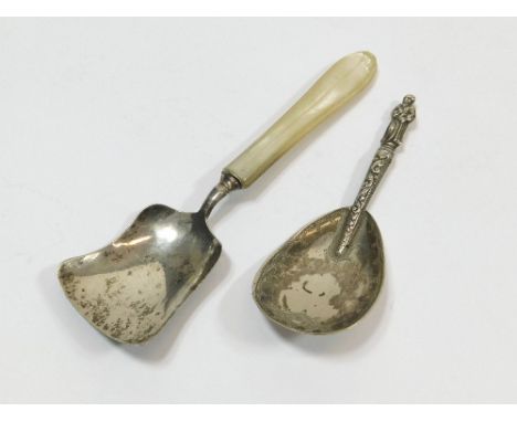 CADDY SPOONS. A Georgian silver & mother of pearl caddy spoon by George Unite. Also, a Victorian caddy spoon with apostle fin