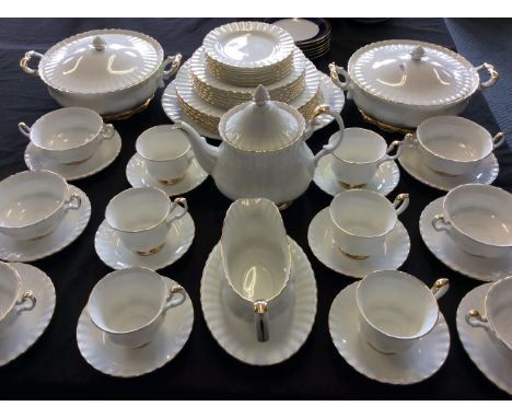 An approximately 45 piece Royal Albert tea and dinner service together with a set of Romanov coffee cups, saucers and plates.