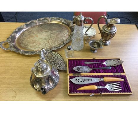 A mixed lot of silver plated to include large twin handled tray, toast rack, cased knife and fork set, silver topped glass bo