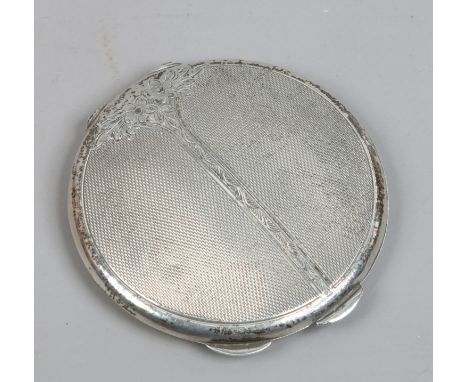 A ladies silver cased compact with engine turned engraving and internal inscription, assayed Birmingham 1979.