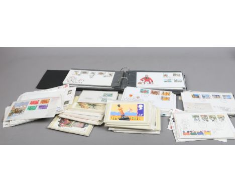 Album of 100 first day covers including Jersey, Guernsey and Great Britain along with a collection of PHQ cards including fra