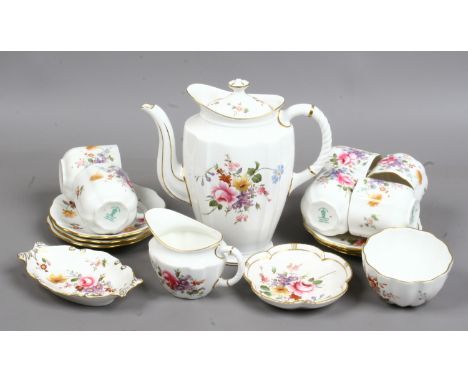 A quantity of Royal Crown Derby bone china decorated in the Derby posies pattern including a tea service, trinket dishes etc.