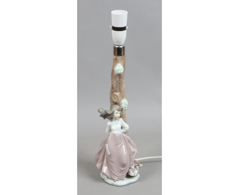 A Nao figural tablelamp base.