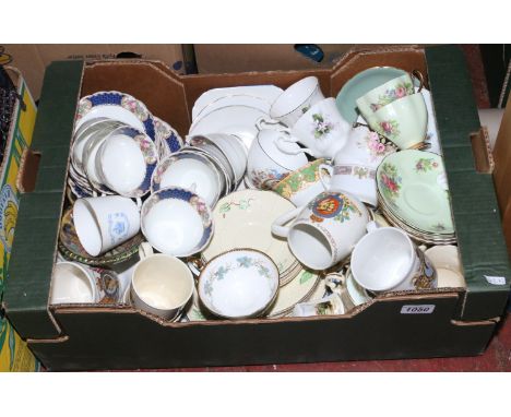 A box of mixed china and pottery including Royal Doulton, Wedgwood, Crown Devon part tea service, commemorative wares, Delft,