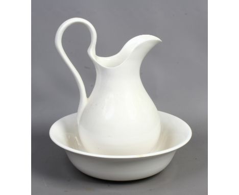 A white ceramic jug and bowl set.