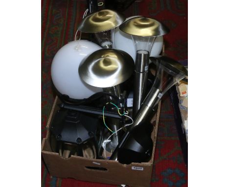 Outdoor lighting; a box of unused garden lights including set of four post lamps and a pair of bracket lanterns.
