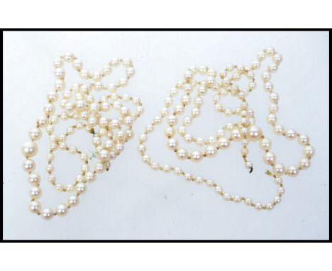 Two vintage pearl necklaces with knotted string and graduated pearls - without clasps. Measures 21 inches. Weight 26.6g