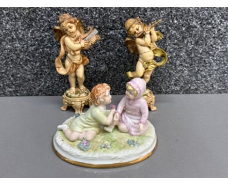 Pair of vintage Fontanini depose Italy cherub cupid figures playing harp &amp; flute, together with a Portuguese Epoca group 