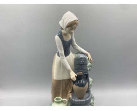 Nao by Lladro Lady filling jugs in good condition