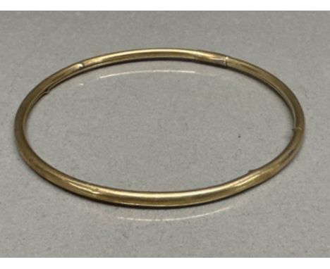 9ct yellow gold slave bangle - 3.9g