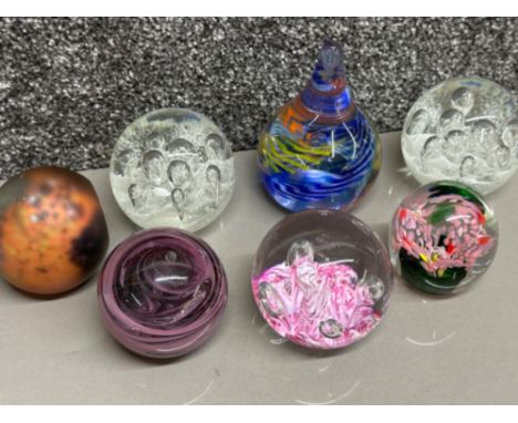 Box containing 7 glass paperweights including Caithness &amp; Mdina etc