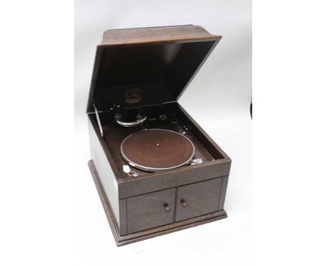 A c.1930's His Master's voice branded oak cased tabletop windup gramophone model 109, having chromed fittings and double door