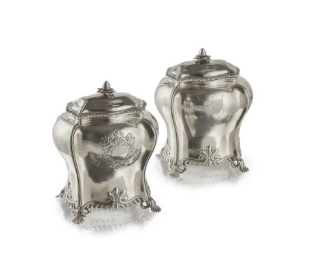A pair of George II tea caddiesprobably Samuel Courtauld, London 1759, of bombe form, vacant cartouche to front, shield to re