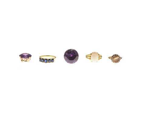 A collection of gem set jewelleryto include a five stone sapphire set ring, stamped 750; an opal set ring, stamped 750; a syn