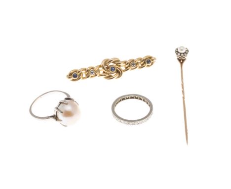 A collection of jewelleryto include a diamond set eternity ring, unmarked; a large cultured pearl set cocktail ring, plain wh