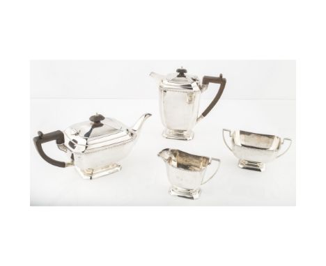 A four piece tea serviceRobert Stewart, Birmingham 1933, comprising; a teapot, water pot, two handled sugar bowl, milk jug, a